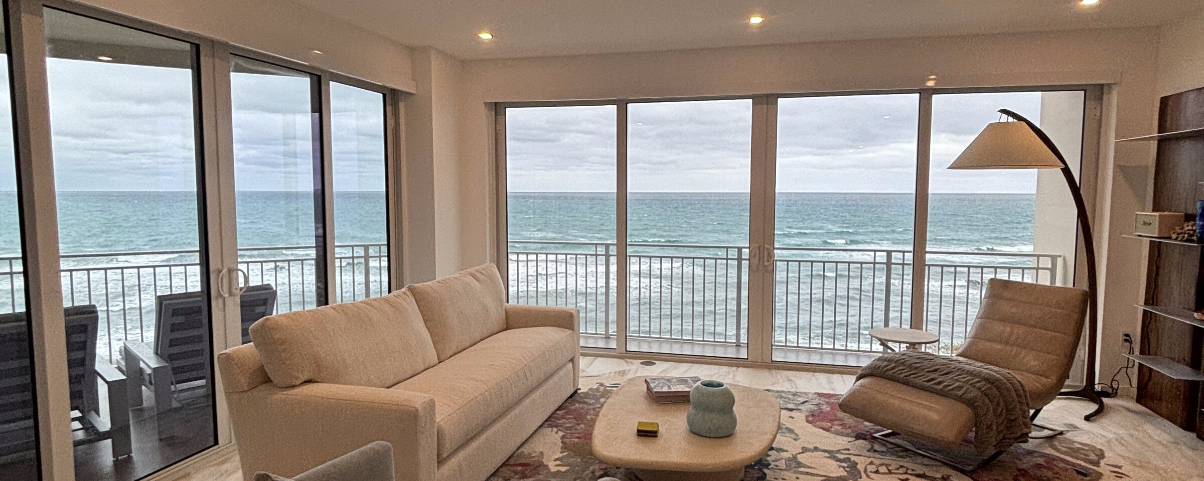 Ocean view through a freshly cleaned window at a Palm Beach County home